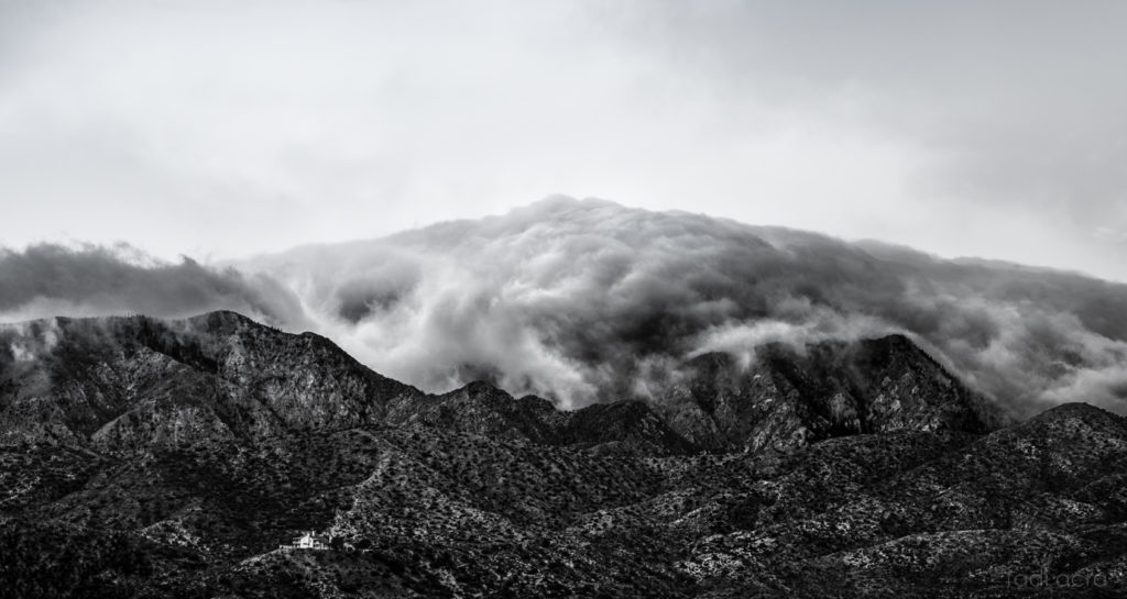 photo of mountain with clouds