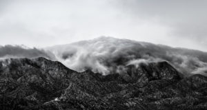 photo of mountain enveloped with morning mist