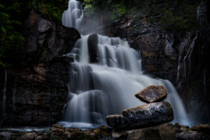 waterfall with balancing rocks