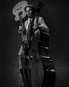 musician with bass and guitar
