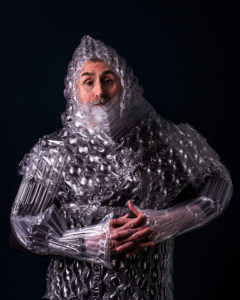 man wrapped in bubble wrap