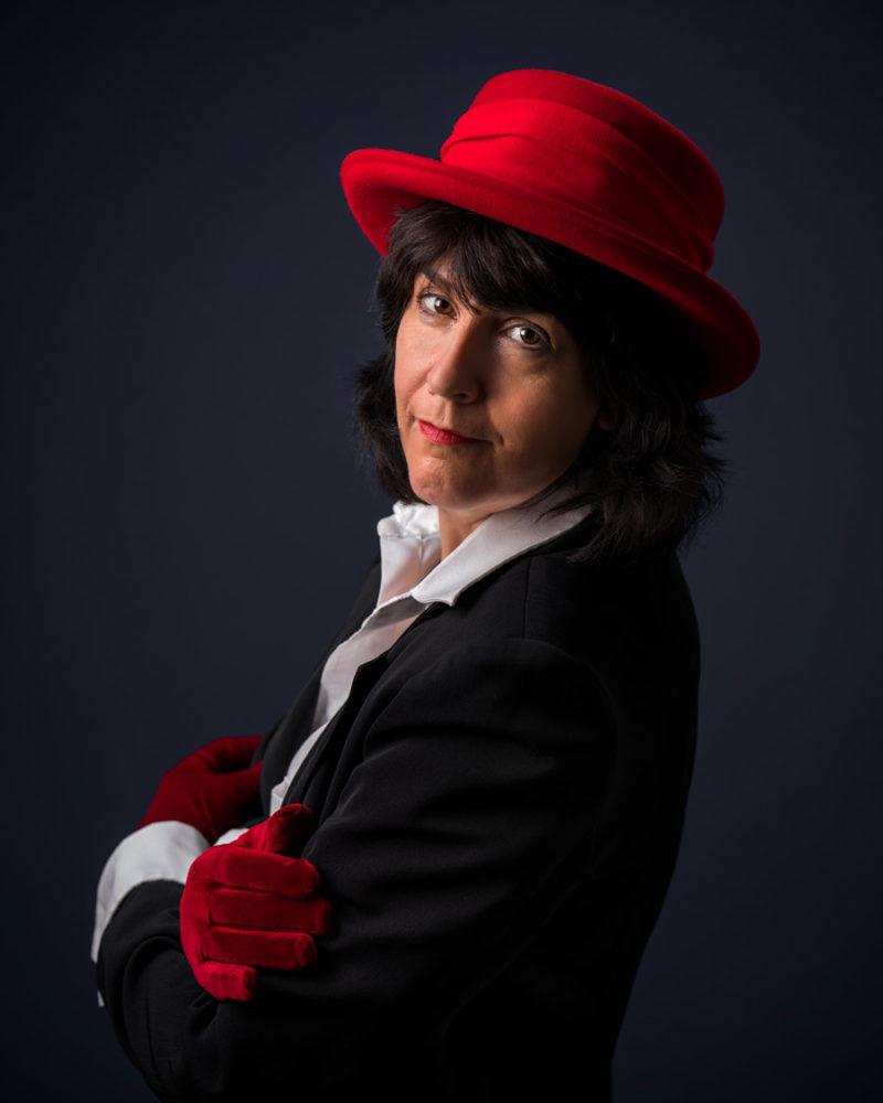 woman in red hat and red gloves