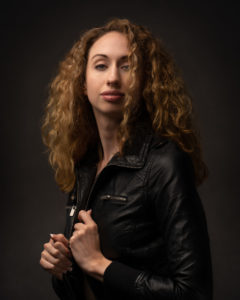 woman in leather jacket