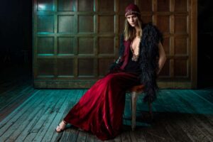 model with red velvet dress